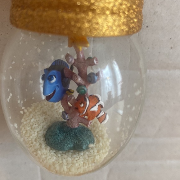Finding Nemo lightbulb shaped ornament with “snow” about 3 inches - Picture 1 of 3